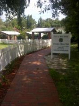 Brick paved sidewalk in Ahmoglee Okalee Park